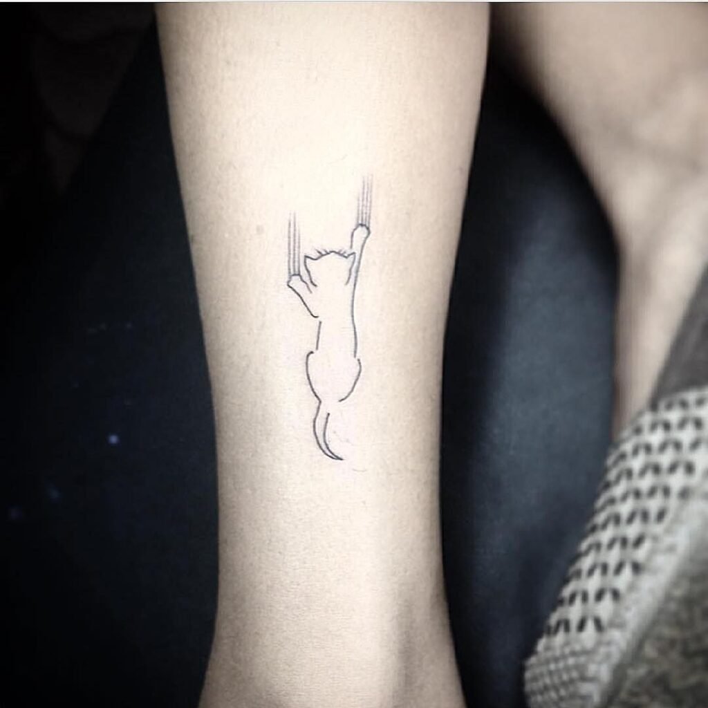 Minimalist Cat Leg Tattoo