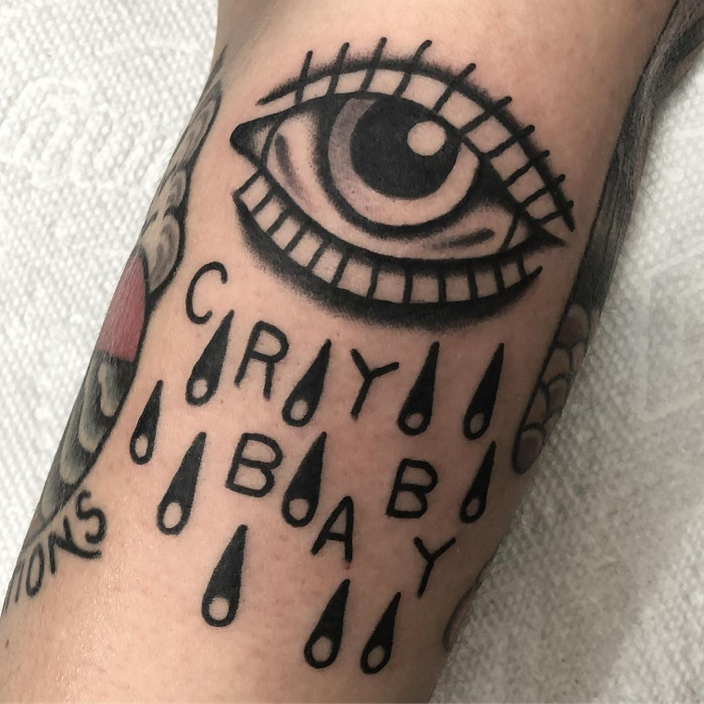 Eyes Crybaby Arm Tattoo