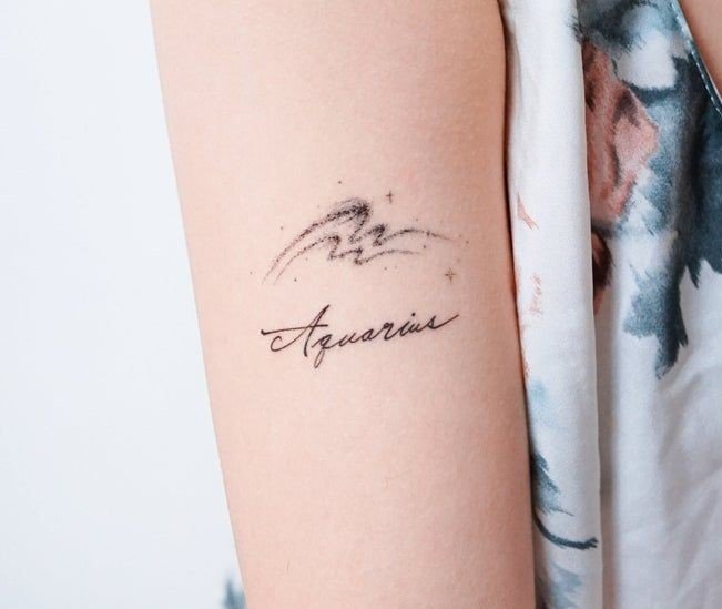 Aquarius Script Arm Tattoo