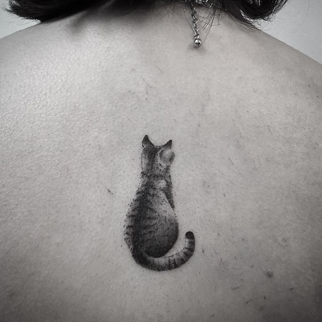 Small Cat Back Tattoo