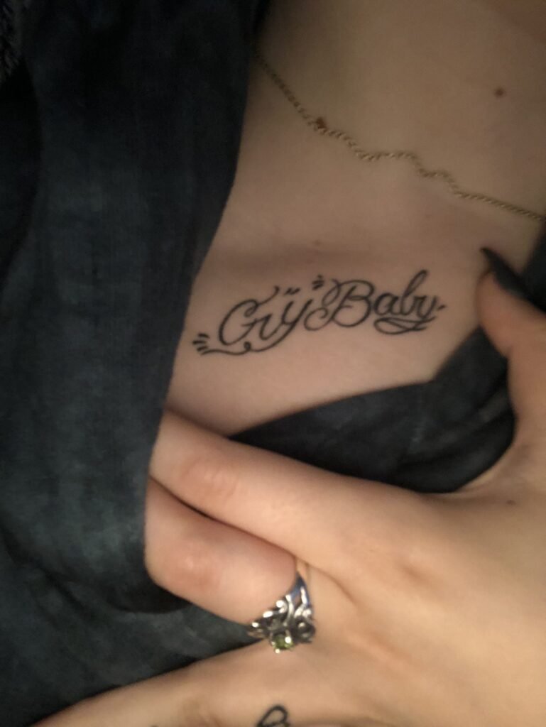 Word Crybaby Chest Tattoo