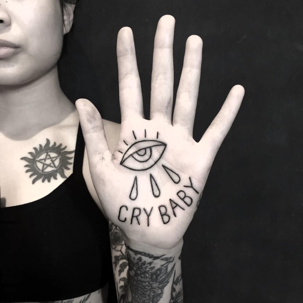Eyes Crybaby Hand Tattoo