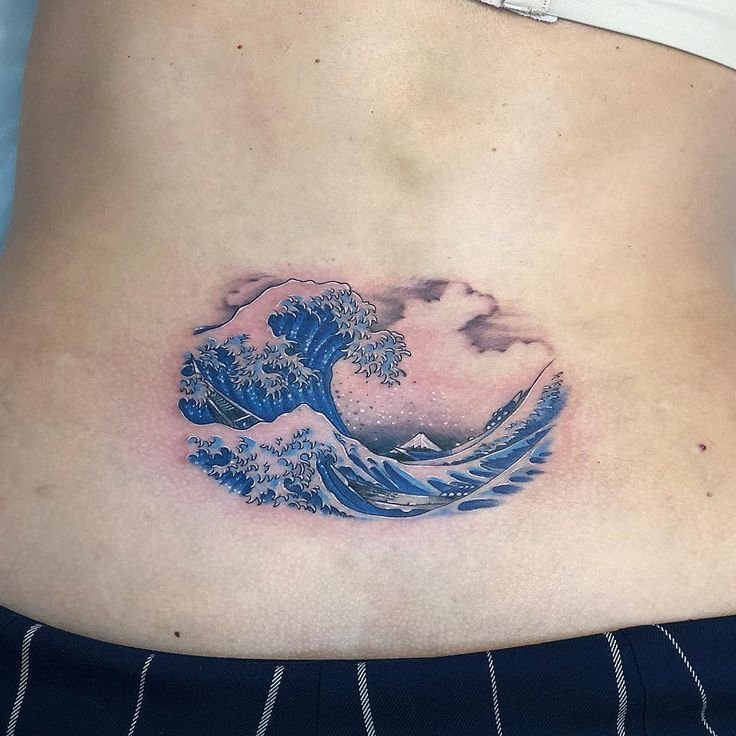 Watercolor Waves LowerBack Tattoo