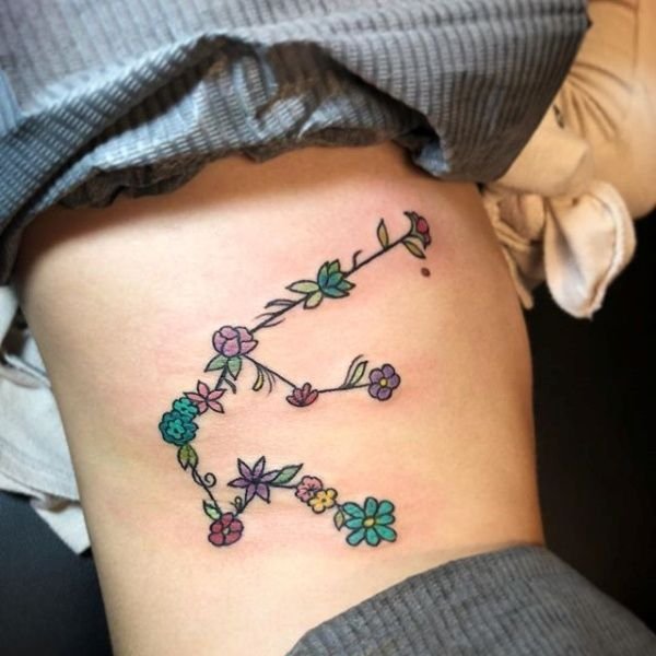 Aquarius Floral Constellation Ribs Tattoo