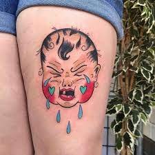 Traditional Crybaby Thigh Tattoo