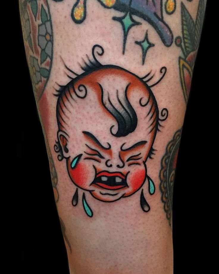 Adorable Crybaby Thigh Tattoo