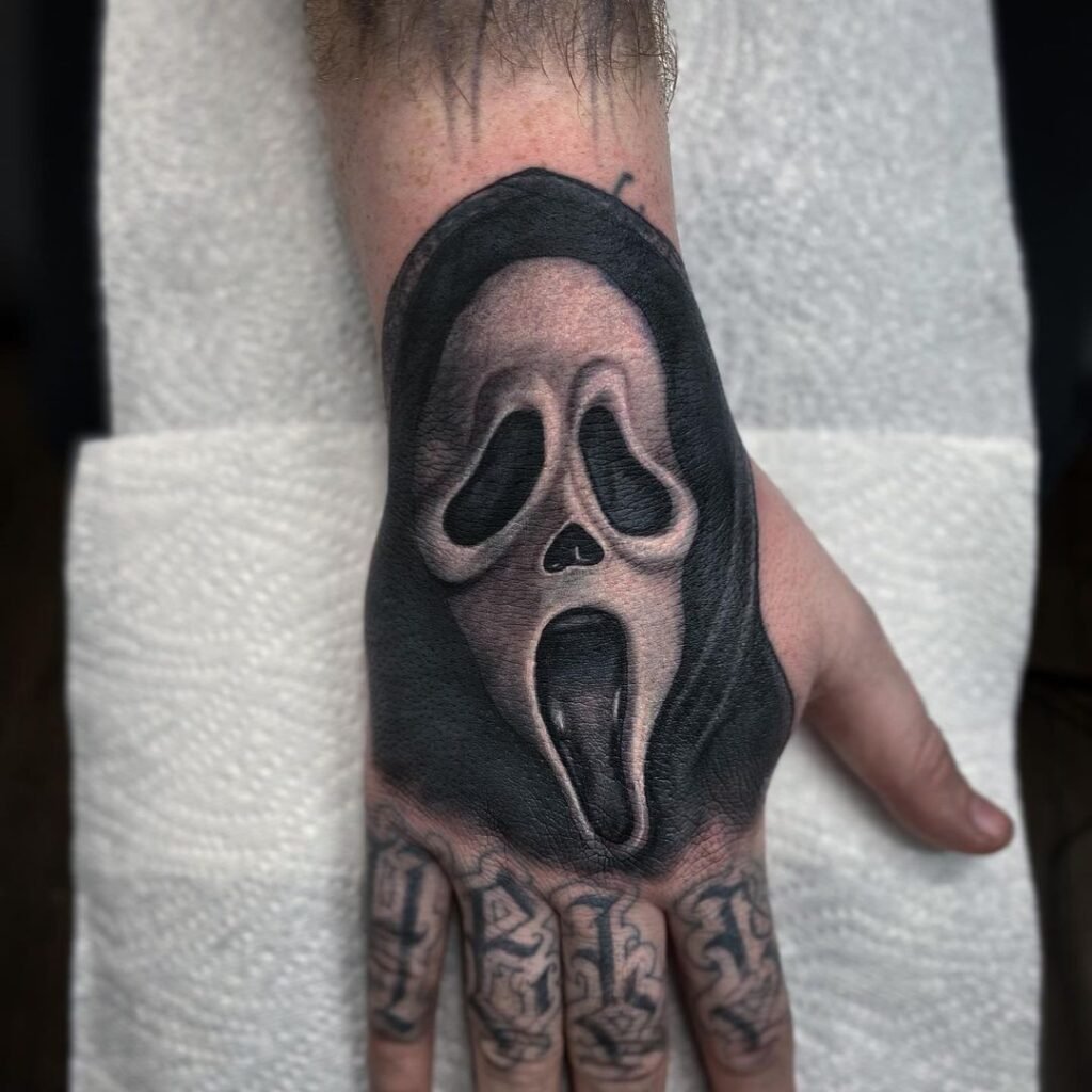hand ghostface tattoo