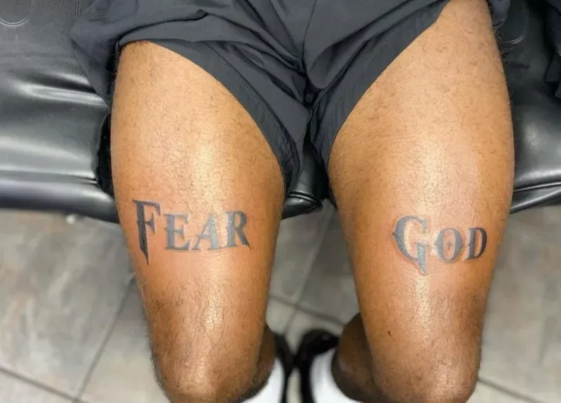 Fear God Thigh Tattoo