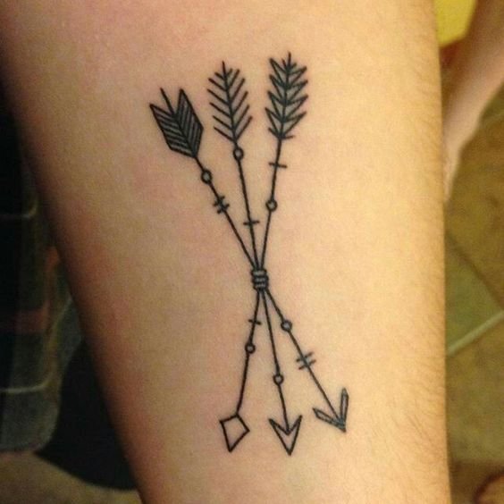 crossed arrow tattoo