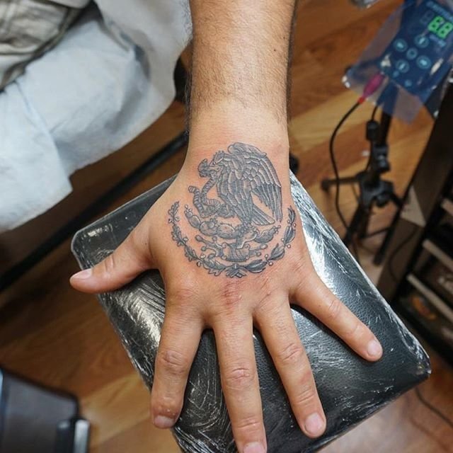 eagle tattoo on hand