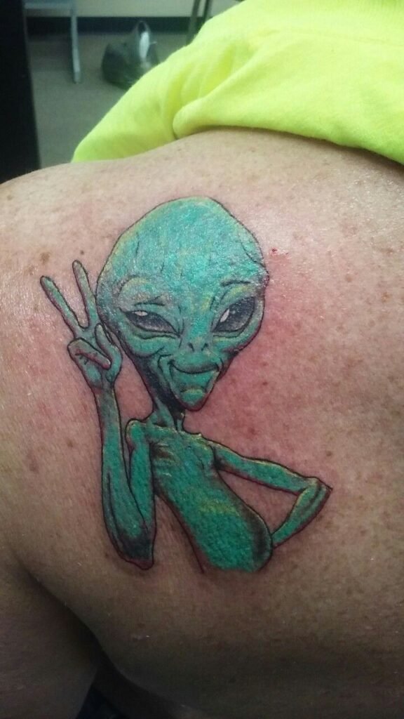 Alien Peace Sign Tattoo