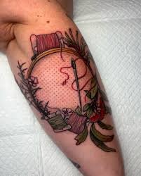 Forearm stitch tattoo