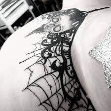 gothic chest tattoo