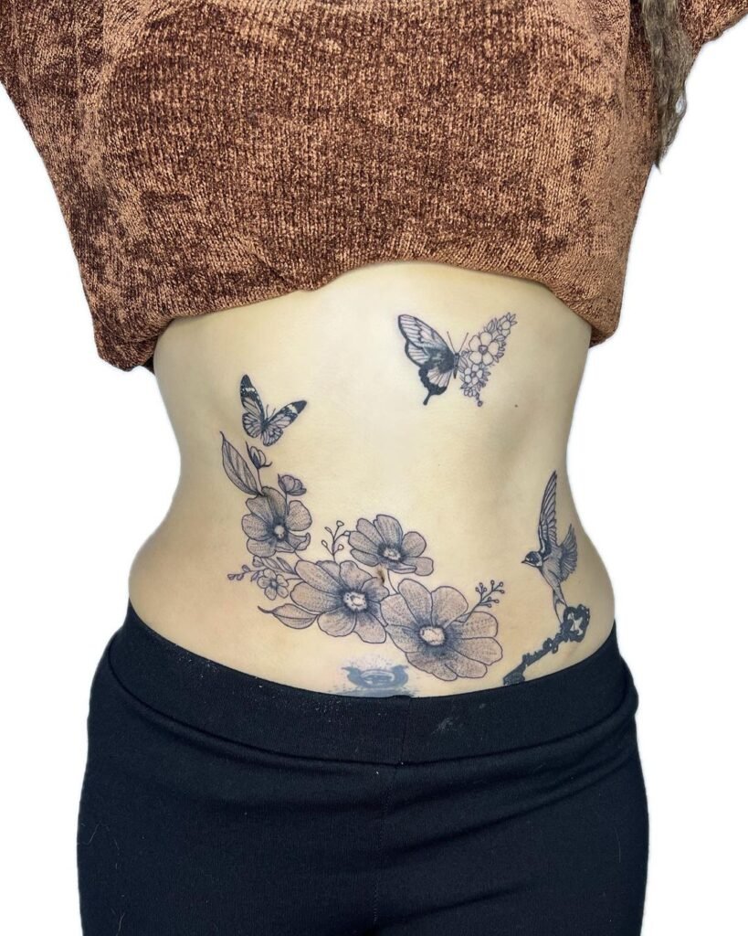 butterfly daisy tattoo