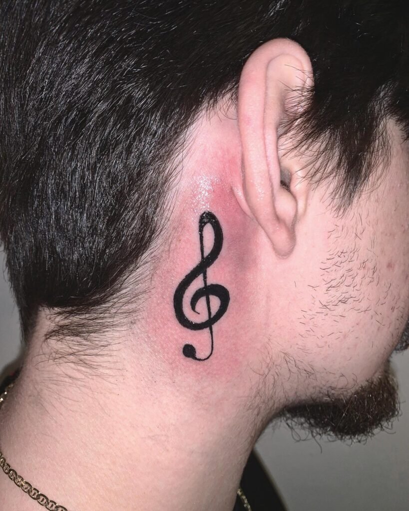 neck musicnote tattoo