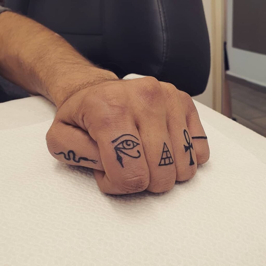 Fingers Egyptian Tattoo