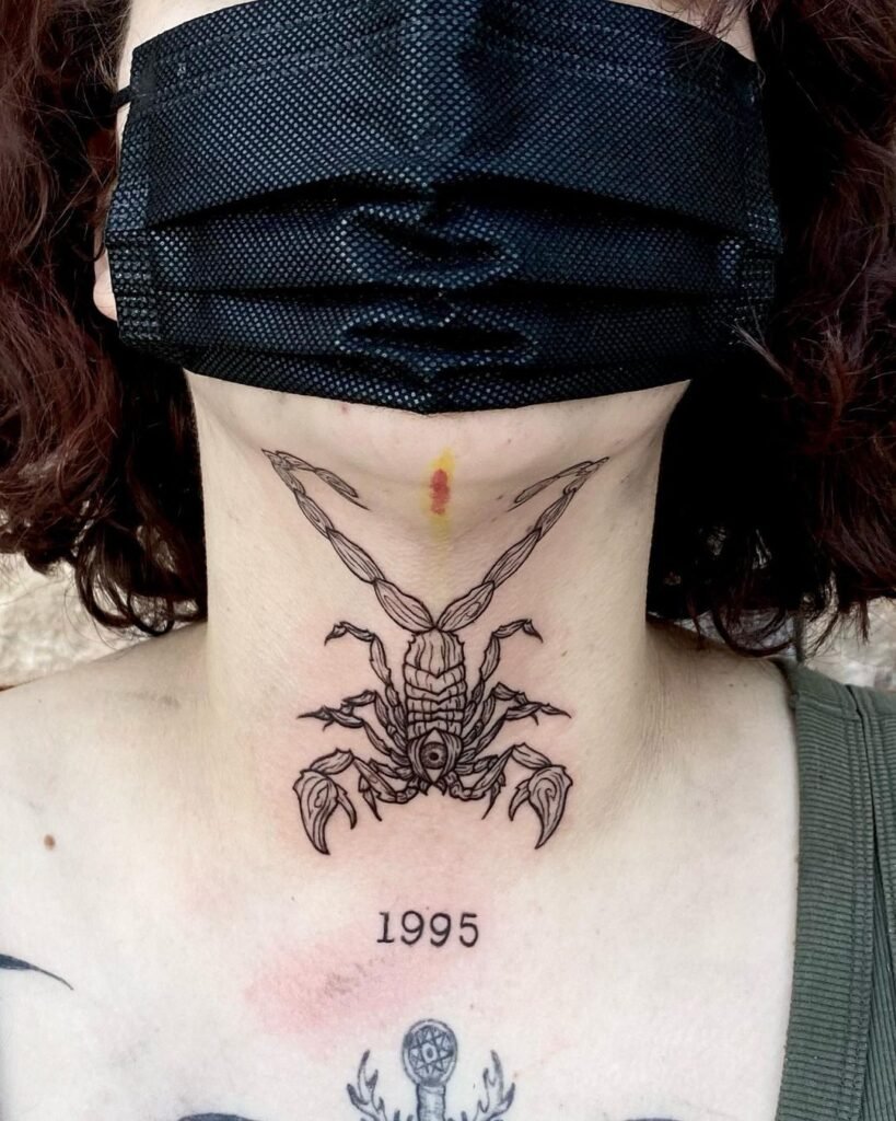 neck scorpion tattoo