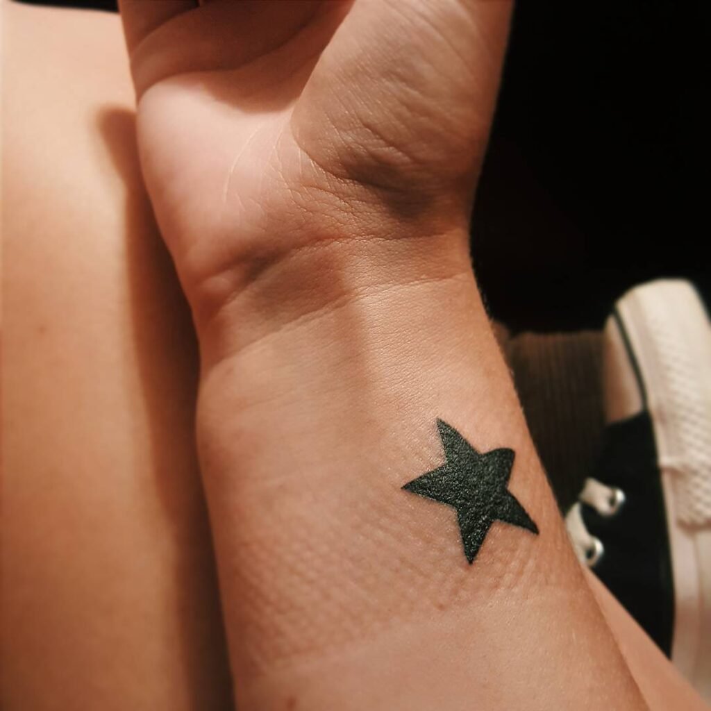 star wrist tattoo