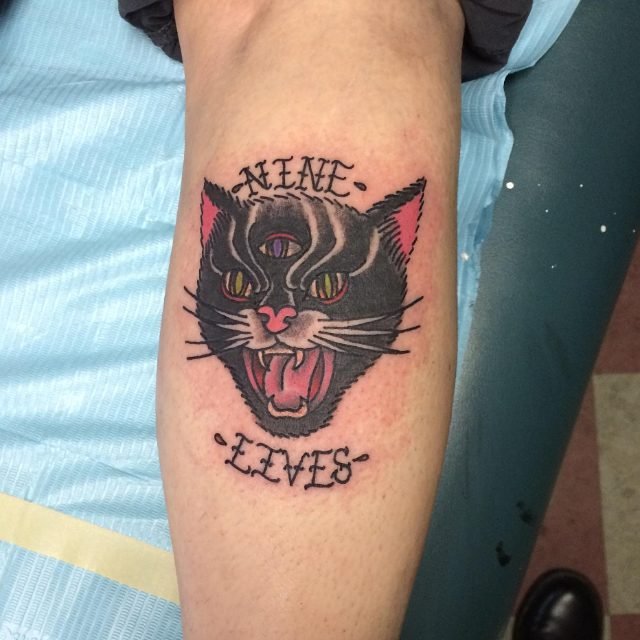 Traditional Black Cat Tattoo